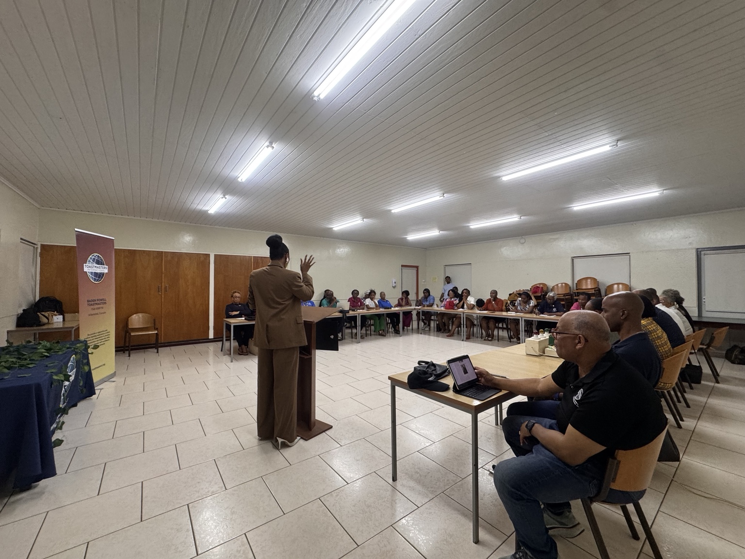 Members and guests listening to Akisha Albert during the August 18 meeting