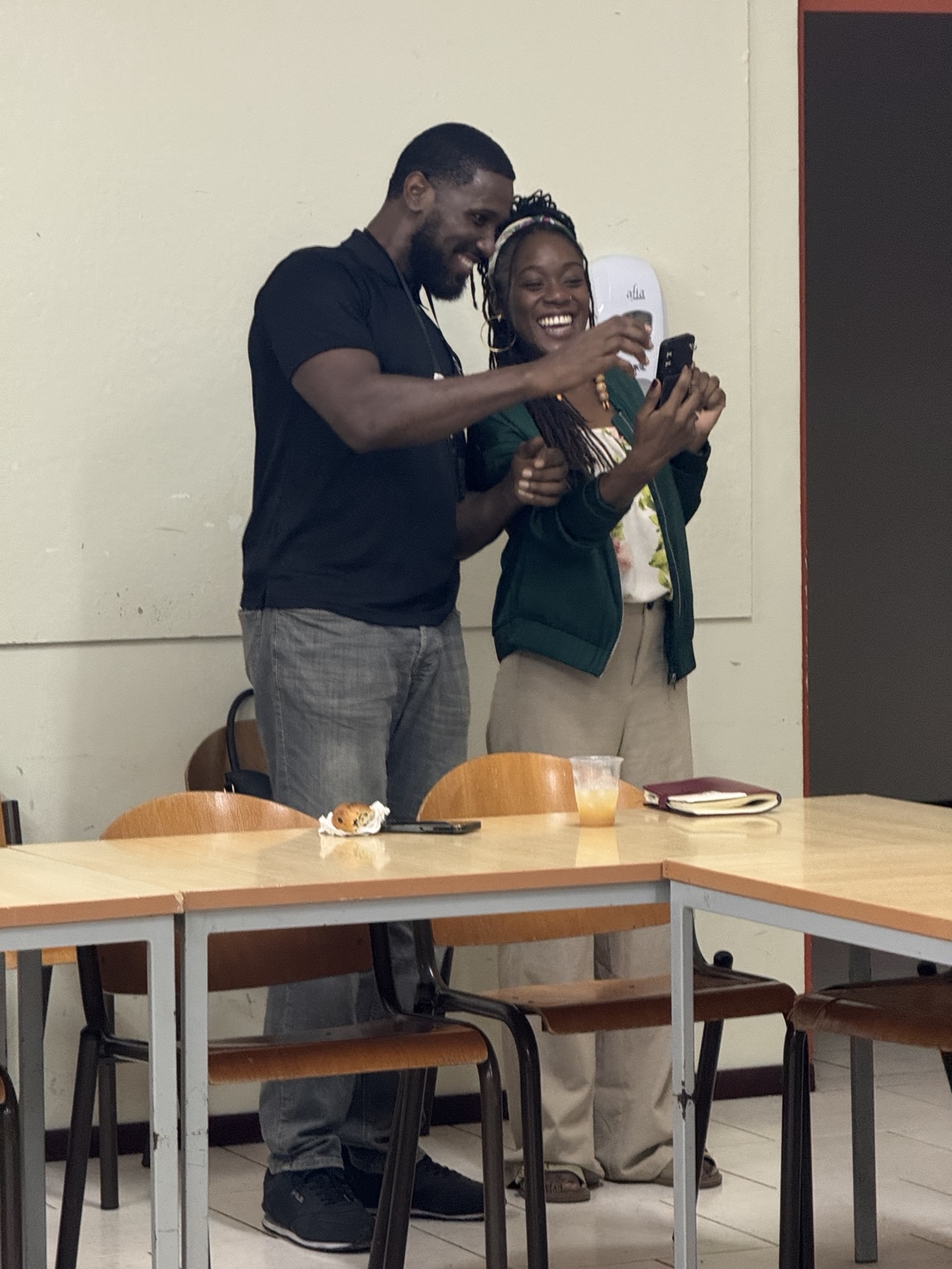 TM Regis Loo and guest Quirijna taking a picture together