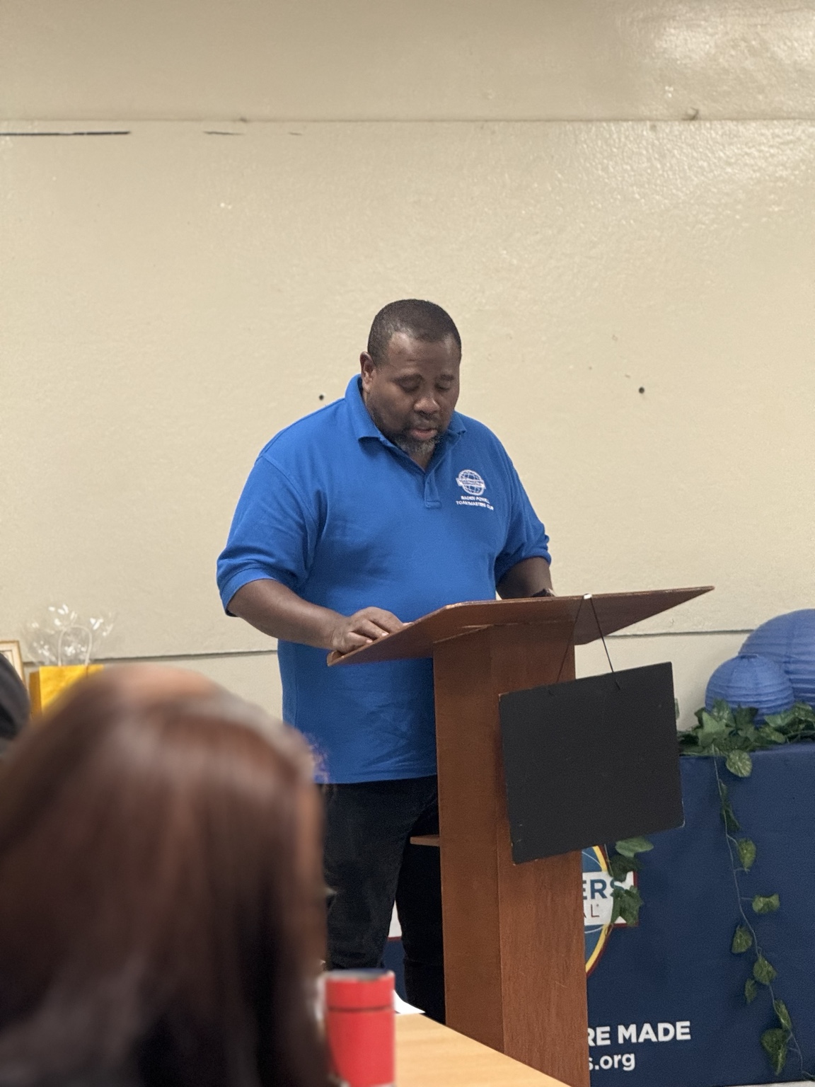 A member speaking from the lectern