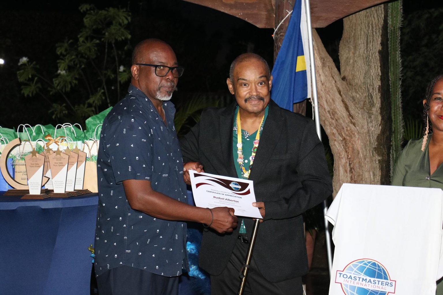 Rudsel Alberto receives a certificate of appreciation